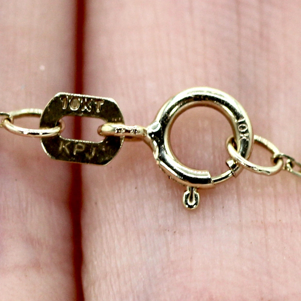 10K Yellow Gold Necklace with Round Brilliant Cut and Baguette Diamonds