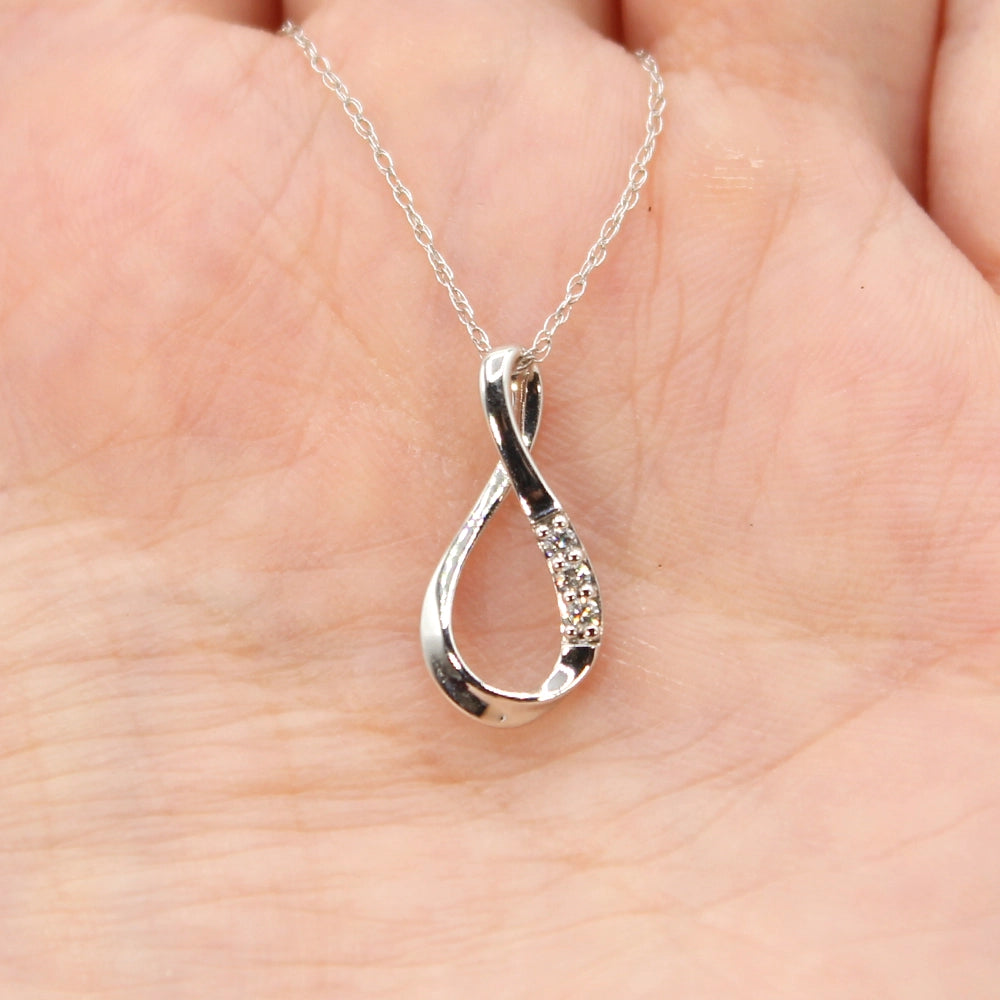14K White Gold and Diamond Infinity Pendant with 18 inch Chain