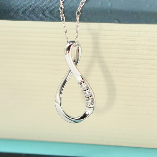 14K White Gold and Diamond Infinity Pendant with 18 inch Chain
