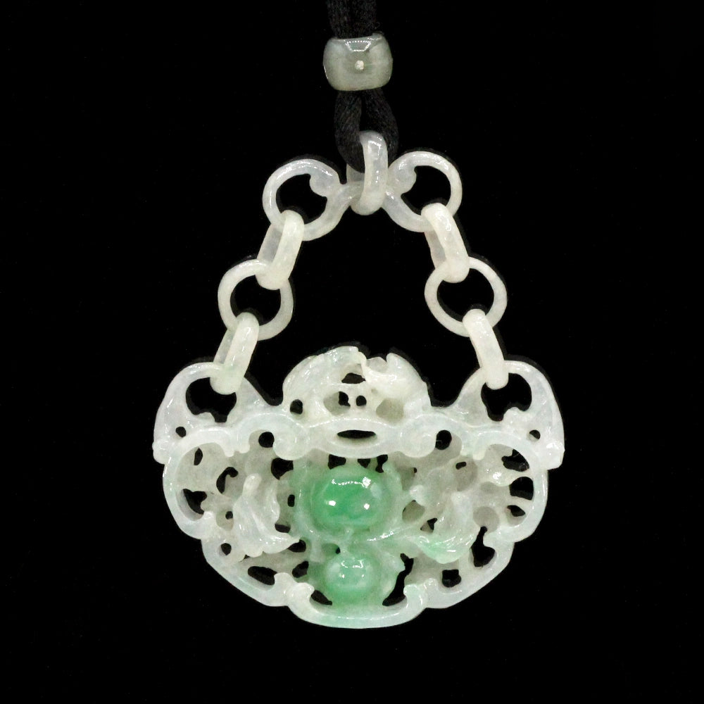 Carved Mottled Green Jade Devils Work Pendant with Birds and Plums