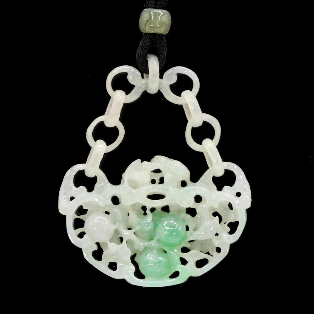 Carved Mottled Green Jade Devils Work Pendant with Birds and Plums