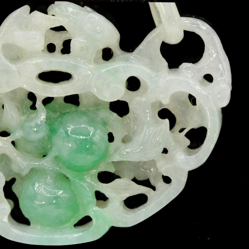 Carved Mottled Green Jade Devils Work Pendant with Birds and Plums