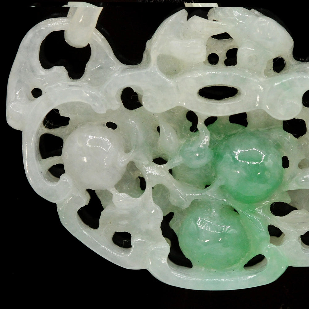 Carved Mottled Green Jade Devils Work Pendant with Birds and Plums