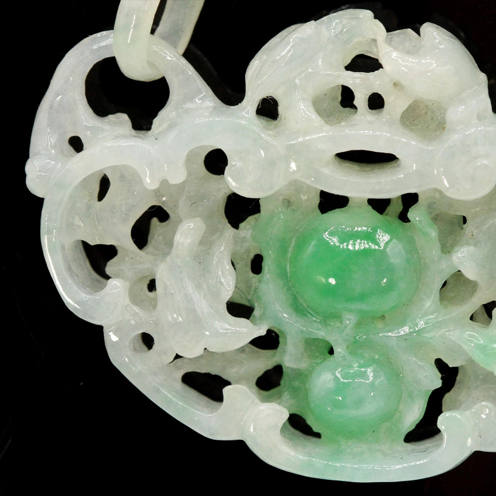 Carved Mottled Green Jade Devils Work Pendant with Birds and Plums