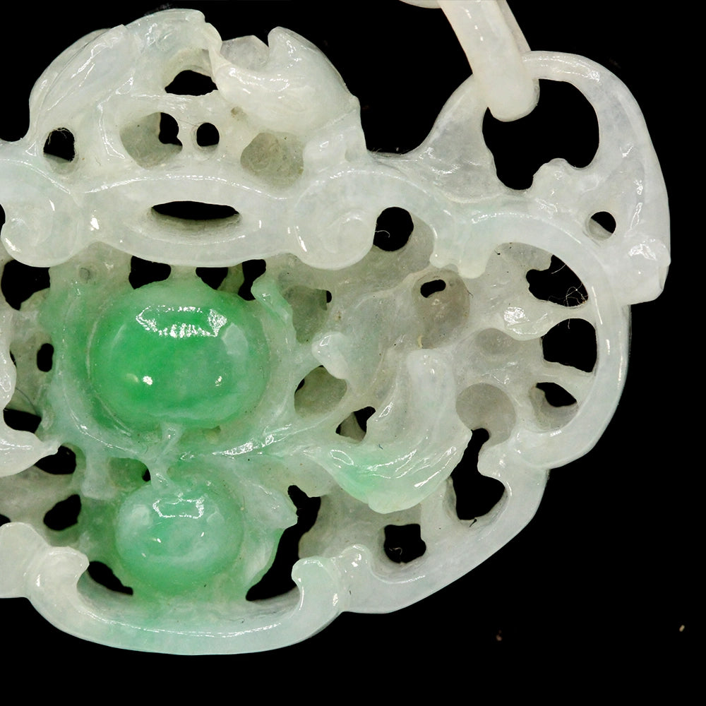Carved Mottled Green Jade Devils Work Pendant with Birds and Plums