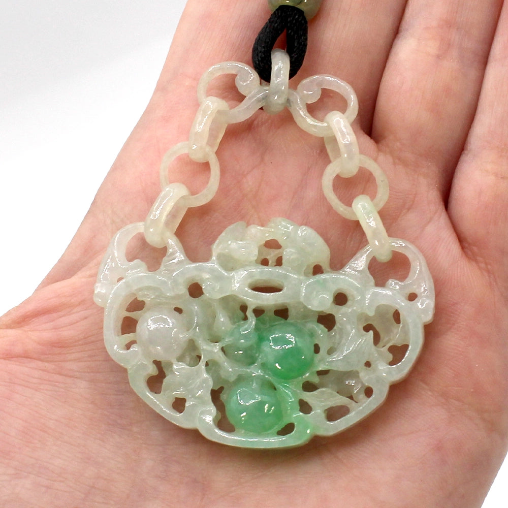 Carved Mottled Green Jade Devils Work Pendant with Birds and Plums