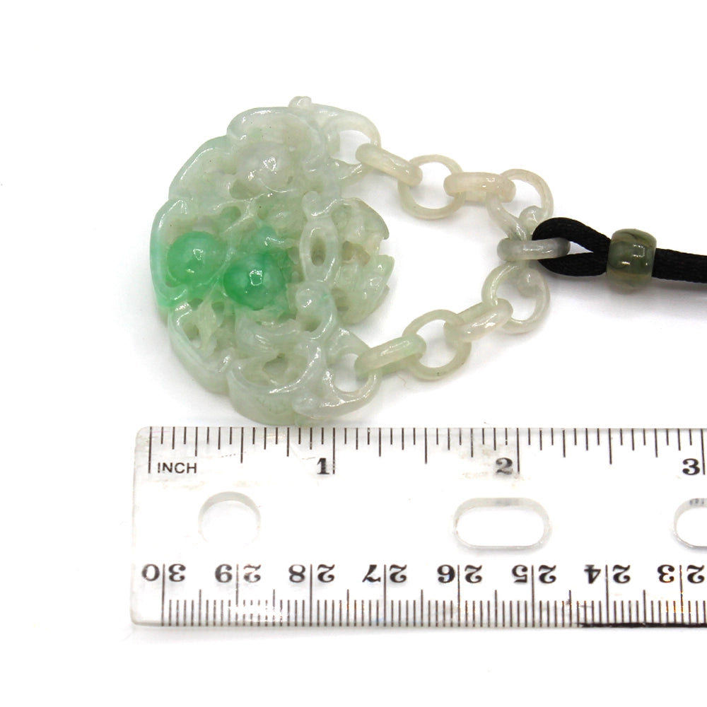 Carved Mottled Green Jade Devils Work Pendant with Birds and Plums